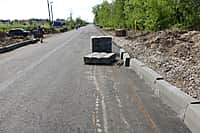 Длившаяся в течение двух лет неразбериха по поводу реконструкции автодороги на улице Ильича наконец-то приобрела осязаемые черты (фото №4).