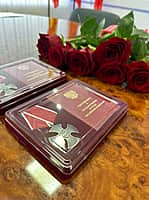 В Канашском МО вручили государственные награды родственникам участников СВО (фото №3).