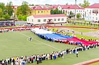 Акция по развертыванию самого большого Государственного флага России площадью 3 750 квадратных метров прошла в Канаше (фото №12).