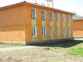 пр‑т Ленина, 64 (г. Канаш) -​ многоквартирный жилой дом.